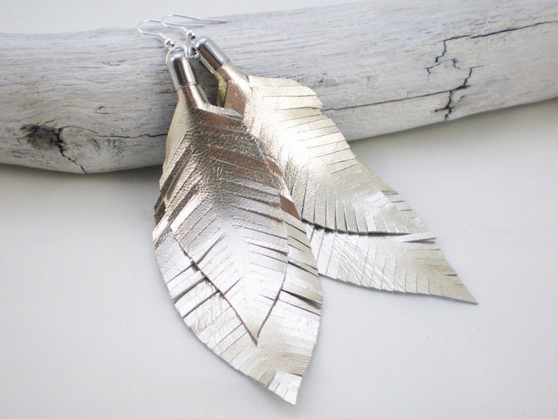 medium feather earrings made of leather in gold metallic image 1