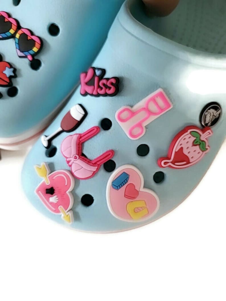pink crocs with charms