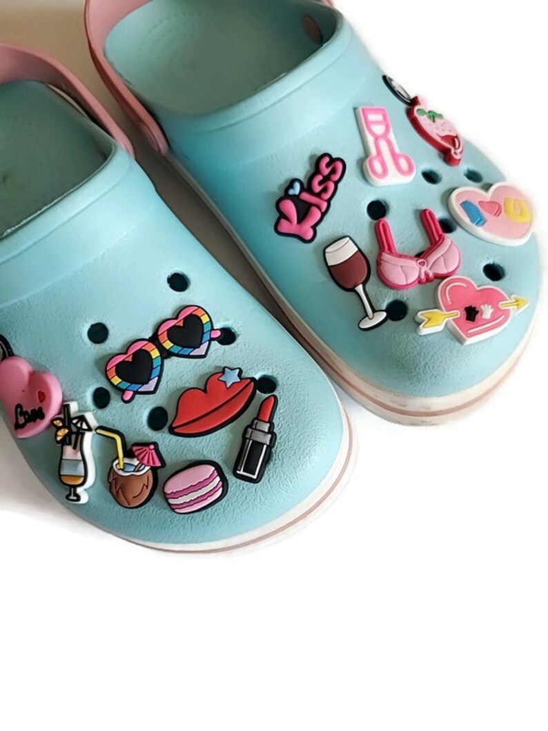 pink crocs with charms