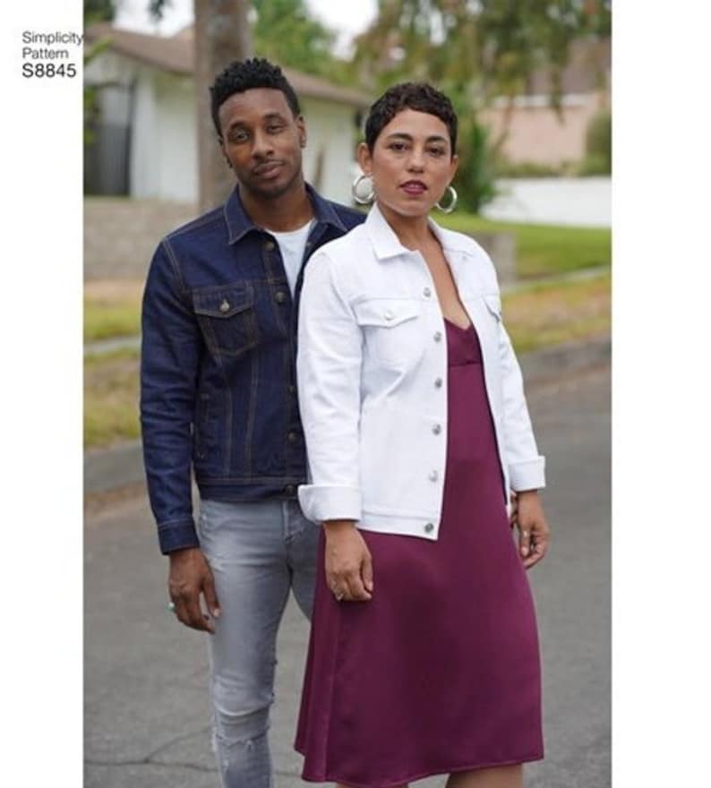 May include: A couple wearing denim jackets. The woman is wearing a white denim jacket over a burgundy dress. The man is wearing a dark blue denim jacket over a grey t-shirt and grey jeans. Simplicity Pattern S8845.