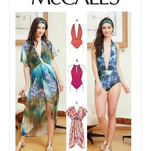 May include: McCall's sewing pattern featuring swimwear and a wrap dress. The pattern includes illustrations of a halter swimsuit, a high-neck swimsuit, and a wrap dress. The models are wearing the finished garments. The pattern number is M7964.