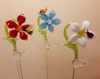 Orchideenstab Blume mit Tier in drei Farben