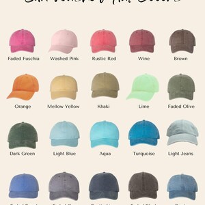 May include: Image showcasing a variety of sun-washed baseball caps in various colors. The hats are arranged in rows, with each hat labeled with its color name, including Faded Fuschia, Washed Pink, Rustic Red, and more. The text "Sun-Washed Hat Colors" is at the top.