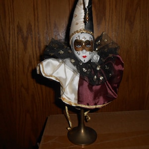 Vintage Porcelain Mardi Gras harlequin Clown Mask on a Brass Stand