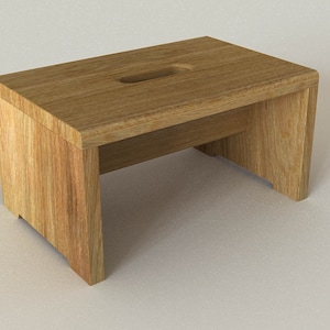 Könnte beinhalten: Ein Holzhocker mit rechteckiger Oberseite und einem Ausschnitt in der Mitte. Der Hocker ist aus hellbraunem Holz gefertigt und hat ein schlichtes Design.