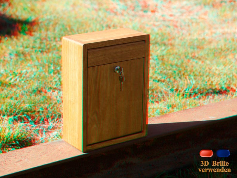 May include: A wooden mailbox with a keyhole and a small drawer. The mailbox is sitting on a brown surface.