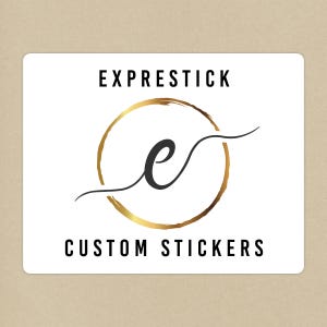 May include: White sticker with black text that reads "EXPRESTICK" and "CUSTOM STICKERS". A gold circle with a black cursive "e" inside the circle.