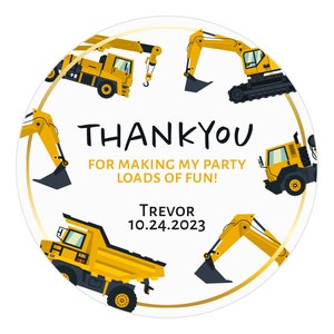 May include: Round thank you sticker with a gold border and yellow construction vehicles. The text reads "Thank you for making my party loads of fun! Trevor 10.24.2023"