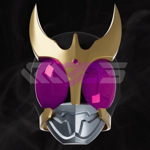 May include: A futuristic mask design with a black base, gold detailing, and large purple oval eyes. The mask has a silver lower section and a gold crown-like element at the top. The design is symmetrical and striking.