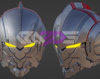 May include: Two metallic silver robot helmets with yellow glowing eyes. The helmets have a detailed, angular design with red accents and a textured surface. The image shows the front and side views of the helmets.
