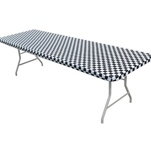 May include: Black and white checkered table cover. The cover is made of plastic and is perfect for protecting your table from spills and stains.