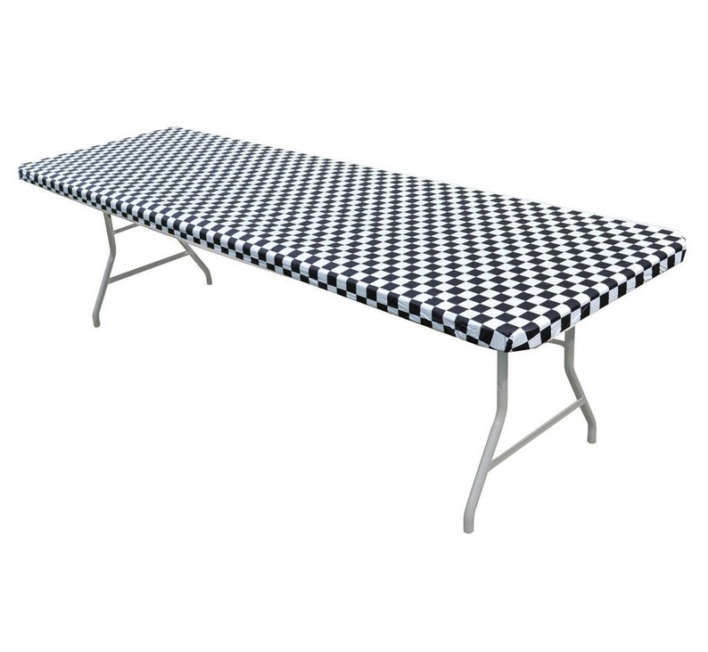 May include: Black and white checkered table cover. The cover is made of plastic and is perfect for protecting your table from spills and stains.