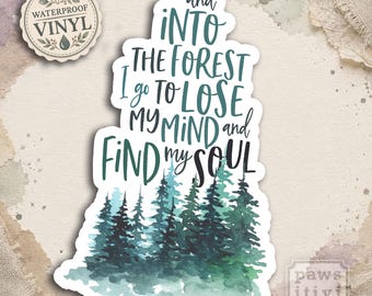 May include: A die-cut vinyl sticker featuring a watercolor forest scene at the bottom in shades of dark green and teal. Above the trees, the text reads: and INTO THE FOREST I go TO LOSE MY MIND and FIND MY SOUL in a mix of script and print.