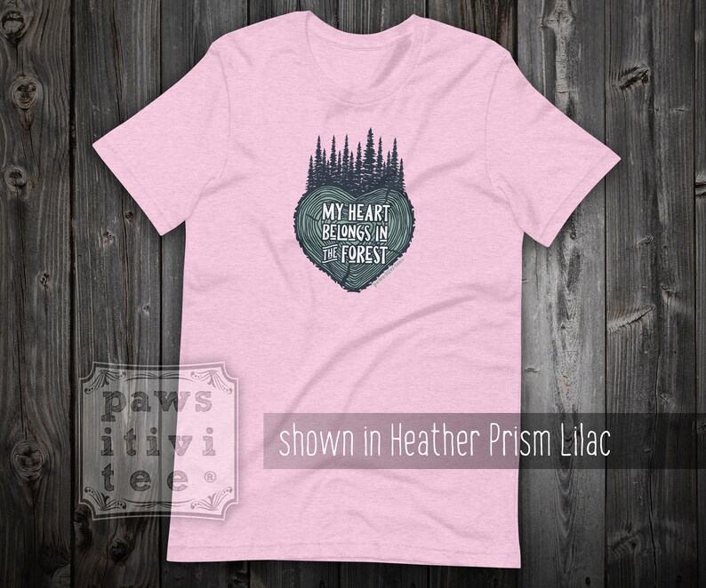 May include: Pink t-shirt with a green tree design and the text "My heart belongs in the forest".