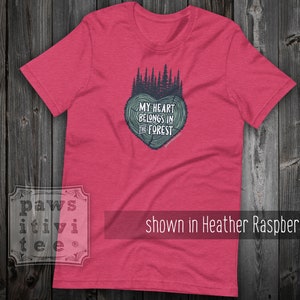 May include: A heather raspberry t-shirt with a forest green graphic of a tree heart with the text "My heart belongs in the forest".