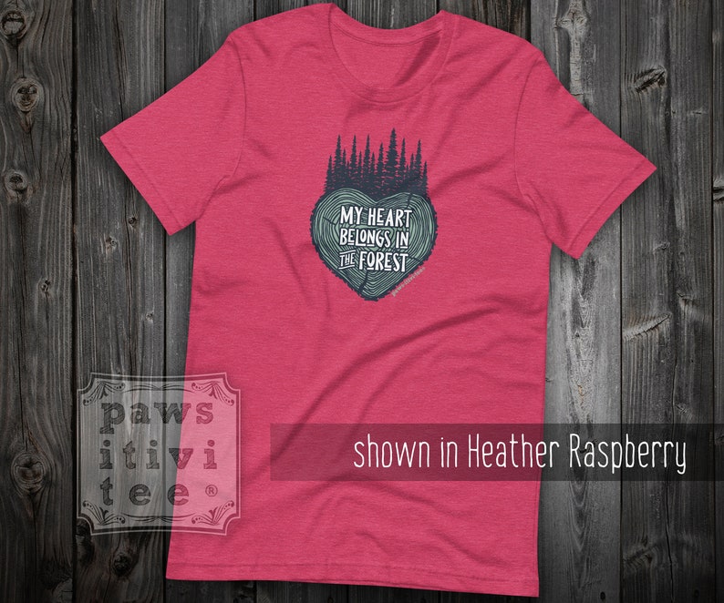 May include: A heather raspberry t-shirt with a forest green graphic of a tree heart with the text "My heart belongs in the forest".