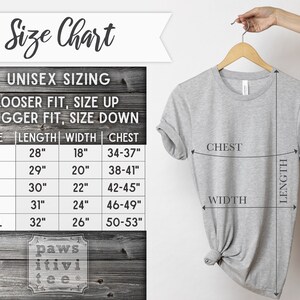 May include: Unisex sizing chart for a t-shirt with measurements in inches for length, width, and chest. The chart shows sizes S, M, L, XL, and 2XL. The chart also includes the text "Looser fit, size up" and "Snugger fit, size down".