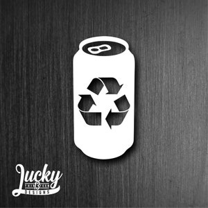 May include: White silhouette of an aluminum can with a recycle symbol on the front. The can is on a dark wood background.