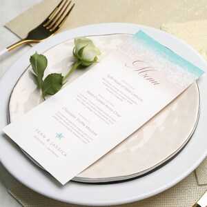 May include: A wedding menu card with a beach-themed design. The menu features a split head of bibb lettuce appetizer, seed-crusted arctic char main course, and chocolate truffle mousse dessert. The card is decorated with a starfish and the text "Sean & Jassica 05.24.2023 | San Marino".