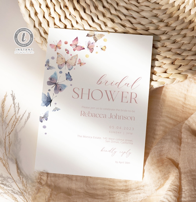 Op de afbeelding: Een witte bruidsdouche-uitnodiging met een roze en blauwe aquarel-vlinderontwerp. De uitnodiging bevat de tekst "bridal shower", "Please join us to celebrate the bride-to-be", "Rebacca Johnson", "05.04.2023", "SUNDAY | 3PM", "The Monica Estate. 145 West.colima street, San Dimas, California", "kindly reply" en "by April 30th".
