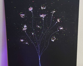 Tin and copper flower with UV colours on black canvas