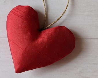 Single Red Silky Heart, Soft-stuffed, with or without twine hanger. Perfect for Valentine's Day, Anniversary, or just to say I love you.