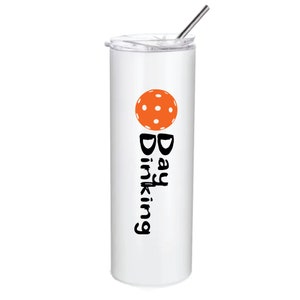 A white stainless steel tumbler with a black and orange logo. The logo features a pickleball and the text 'Day Drinking'.
