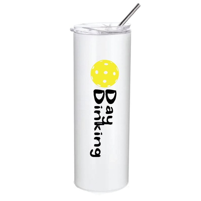 A white stainless steel tumbler with a yellow pickleball and the text 'Day Drinking' in black.