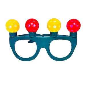 May include: A pair of teal green plastic glasses with four light-up balls on top. The balls are red, yellow, and red.