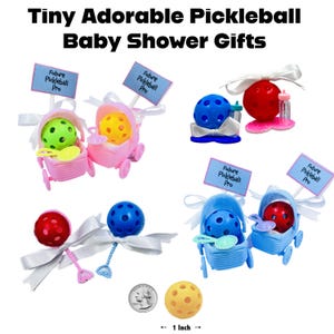 Sets of Pickleball Baby Shower Cupcake toppers and Baby shower gifts.. Blue and Pink baby shower favors with Pickleballs... Baby pickleballs