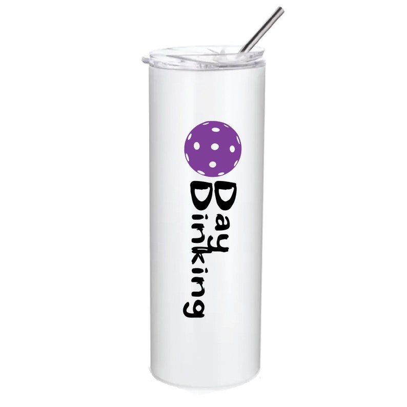 A white stainless steel tumbler with a purple pickleball and the text 'Day Drinking' in black