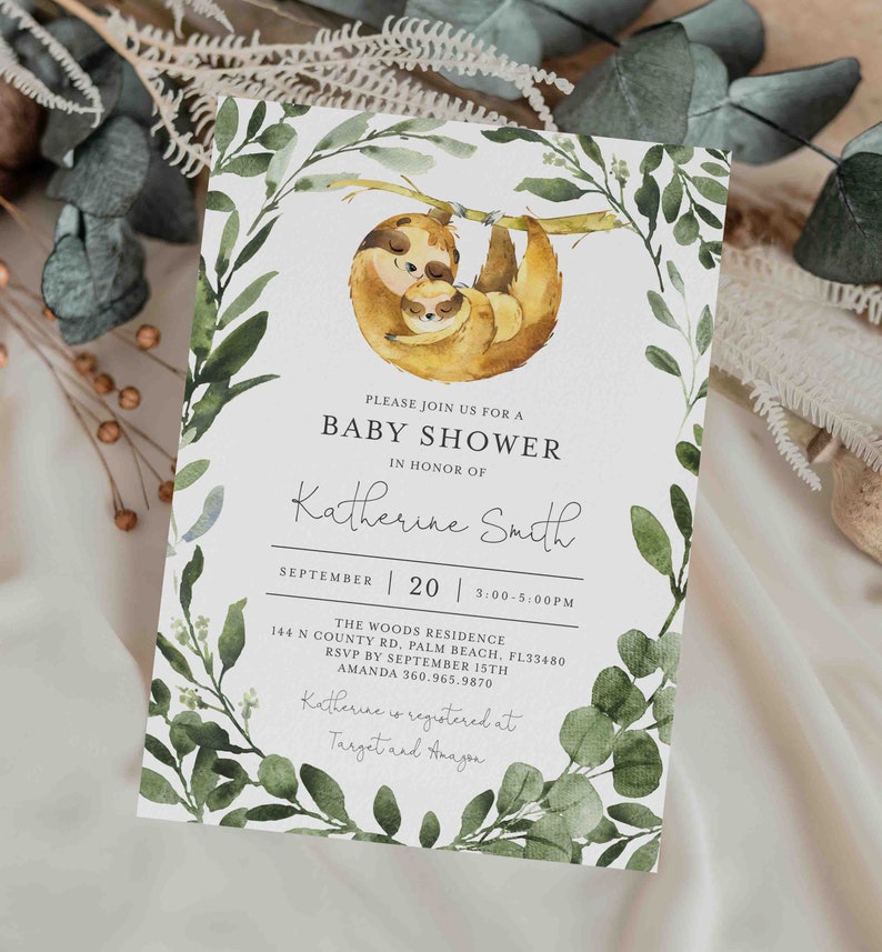 May include: A baby shower invitation with a watercolor illustration of two sloths hanging from a branch. The invitation is for Katherine Smith and includes the date, time, and location of the shower. The text reads: "Please join us for a baby shower in honor of Katherine Smith. September 20 | 3:00-5:00PM. The Woods Residence 144 N County Rd. Palm Beach, FL 33480. RSVP by September 15th. Amanda 360.965.9870. Katherine is registered at Target and Amazon."