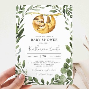 May include: A baby shower invitation with a watercolor illustration of two sloths hanging from a branch. The invitation is for Katherine Smith and includes the date, time, and location of the shower. It also states that Katherine is registered at Target and Amazon.