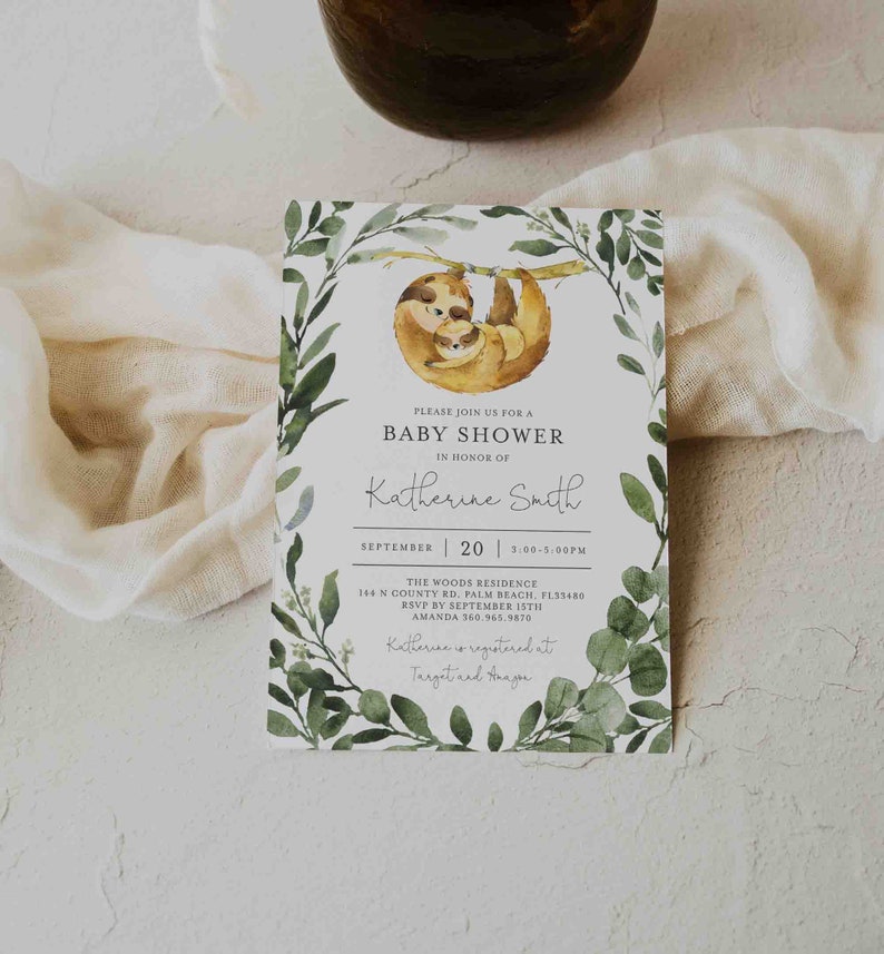 May include: A baby shower invitation with a watercolor illustration of a sloth and its baby hanging from a branch. The invitation is decorated with green leaves and has the text "Please join us for a baby shower in honor of Katherine Smith, September 20, 3:00-5:00PM, The Woods Residence, 144 N County Rd, Palm Beach, FL 33480, RSVP by September 15th, Amanda 360.965.9870, Katherine is registered at Target and Haagen."