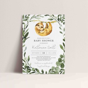 May include: A baby shower invitation with a watercolor illustration of two sloths hugging. The invitation features a green leafy border and the text "Please join us for a baby shower in honor of Katherine Smith, September 20, 3:00-5:00PM, The Woods Residence, 144 N County Rd, Palm Beach, FL33480, RSVP by September 15th, Amanda 360.965.9870, Katherine is registered at Target and Amazon."