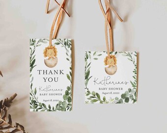 May include: Two green and white thank you tags with a lion cub illustration. The tags are tied with brown twine and have the text "Thank You" and "Katherine's Baby Shower August 18, 2020".