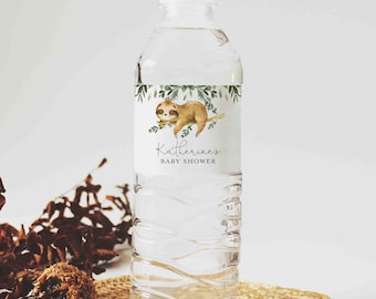 May include: A clear plastic water bottle with a white label featuring a cartoon sloth and green leaves. The label reads "Katherine's Baby Shower".
