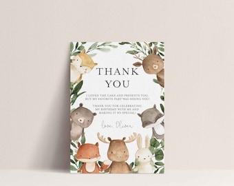 May include: A thank you card with a watercolour design featuring woodland animals and greenery. The text reads "THANK YOU" and includes a personal message. The card is suitable for a birthday celebration.