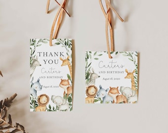 May include: Two thank you tags with a jungle animal theme. The tags are green with a white border and feature a variety of animals including a zebra, giraffe, lion, elephant, and rhino. The text on the tags reads "Thank You Carter's 2nd Birthday August 18, 2020".