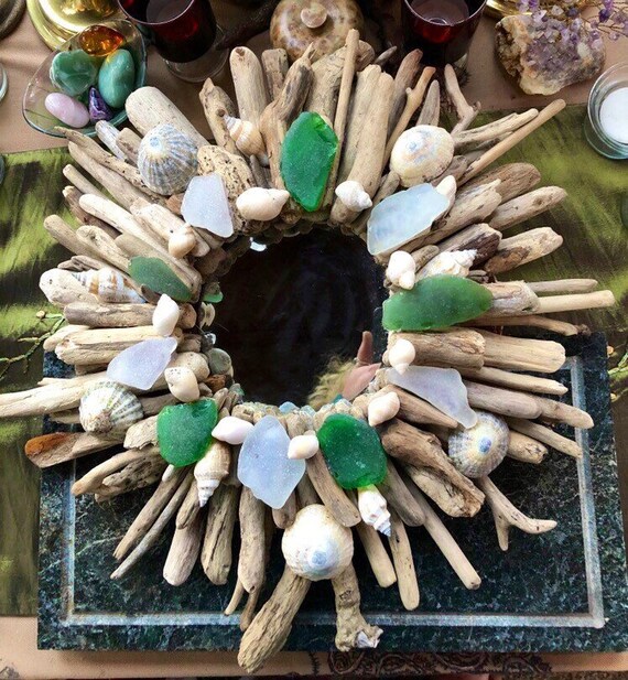 Pretty simple diy drift wood mirror: etsy