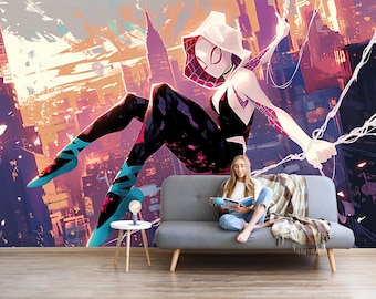 May include: A wall mural featuring a stylized illustration of Spider-Gwen in a black, white, and pink suit, swinging through a vibrant, abstract cityscape with orange and purple hues. The character wears a hood and mask, with web lines extending outward.