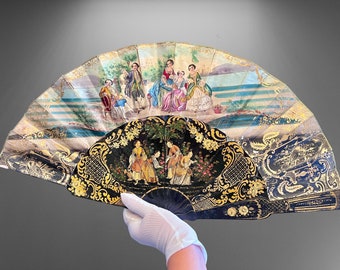 A stunning antique fan made from black lacquered wood. Fine elegant painting, gold engraving. Spanish antique fan. Self made. Victorian fan.