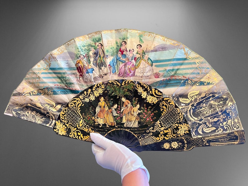 A stunning antique fan made from black lacquered wood. Fine elegant painting, gold engraving. Spanish antique fan. Self made. Victorian fan. image 1