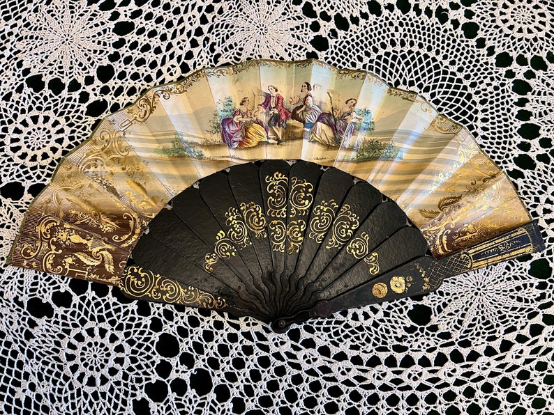 A stunning antique fan made from black lacquered wood. Fine elegant painting, gold engraving. Spanish antique fan. Self made. Victorian fan. image 7