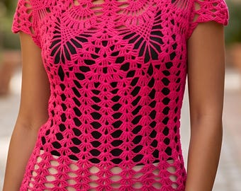 May include: A bright hot pink crochet top featuring an intricate openwork fan pattern throughout the garment. The short-sleeved shirt has a scalloped neckline and a semi-sheer construction, worn over a solid black base layer and light-colored bottoms.