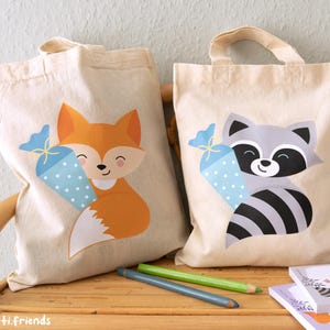 petit sac en tissu pour la scolarité du renard/raton laveur