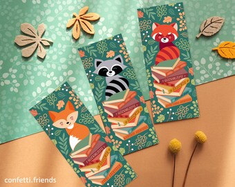 Bookmarks with red panda, raccoon and fox on stack of books