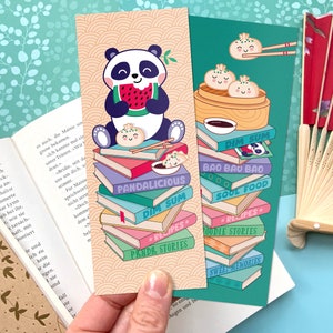 Bookmark with hungry panda and dim sum on stack of books