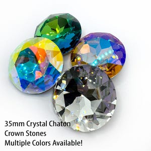 May include: Four 35mm crystal chaton crown stones in various colours. The faceted stones reflect light, showing a range of colours including green, purple, and iridescent hues. Text on the image reads "Multiple Colours Available!"