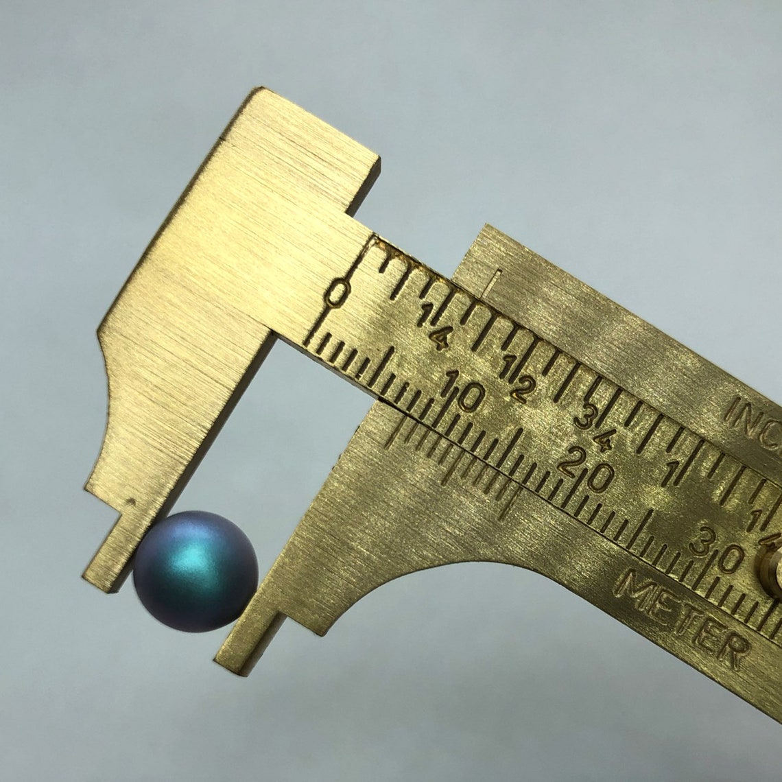 thumbnail interactive-video image 1 of Platinum Brass Sliding Gauge – Precision Millimeter & Inch Measurement Tool – Made In India 1 of 6